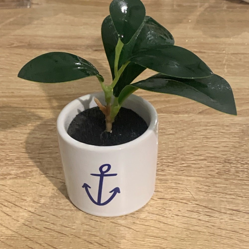 Cute small artificial potted plant